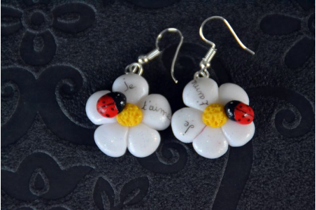 Boucles d'oreilles Coccinelle sur sa fleur